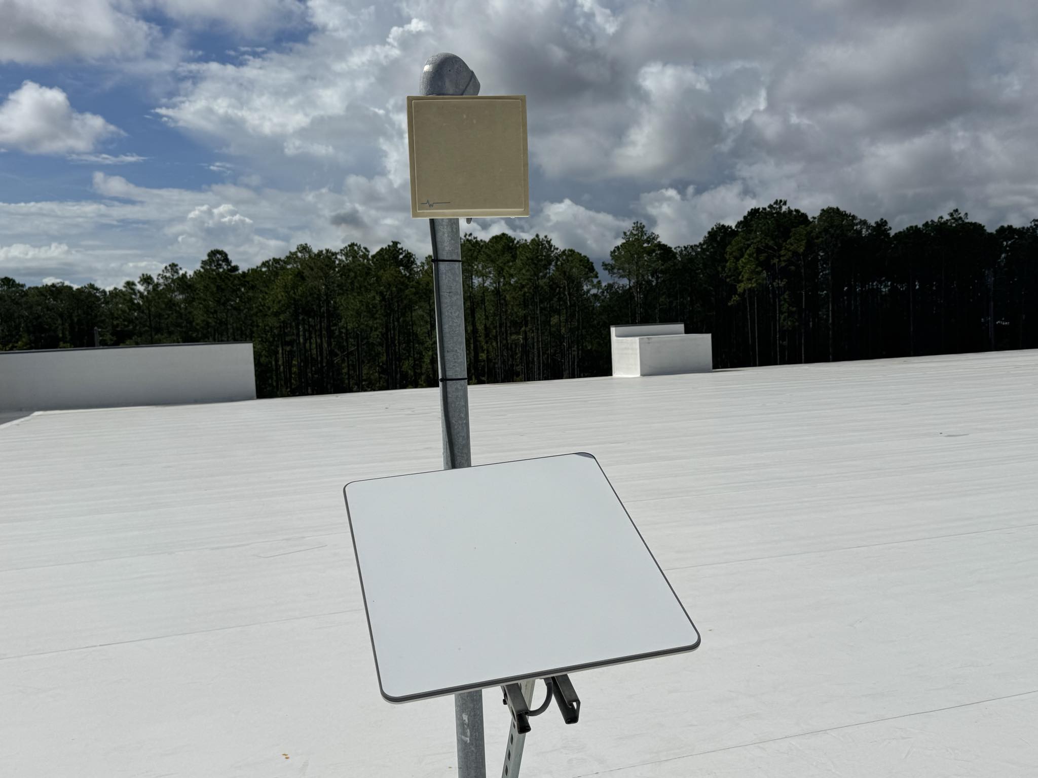 Starlink dish on commercial rooftop